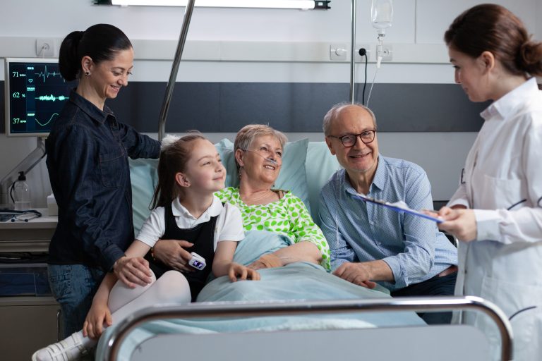 Healthcare professional checking elderly patient activity at clinic